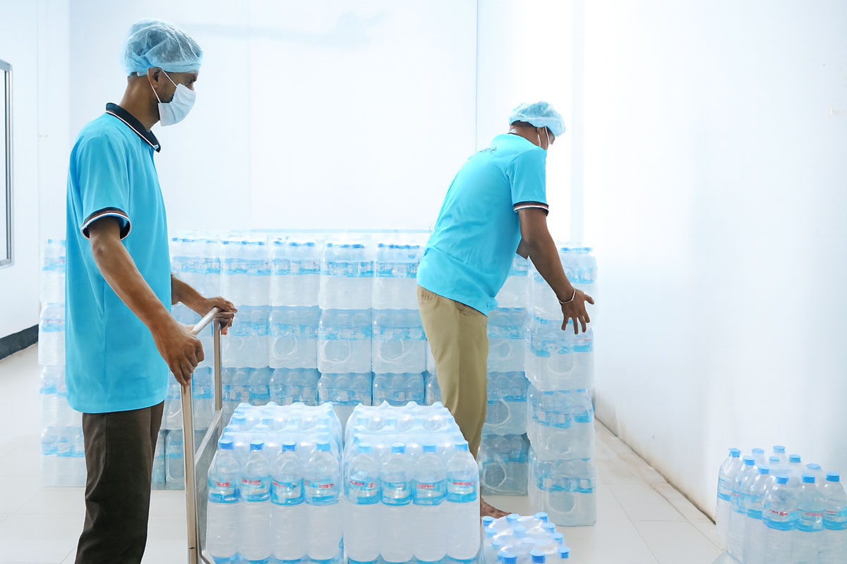 Stacking Labeled Bottles in the Storage Area